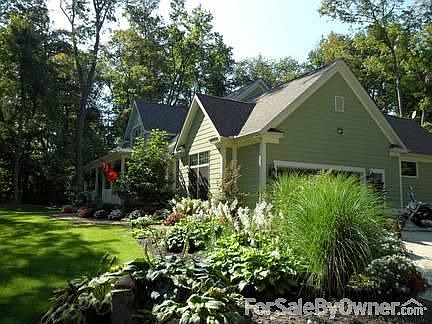Spacious kitchen/living area
						:
						Cook, socialize, watch TV all from a beautiful setting, with access to back deck