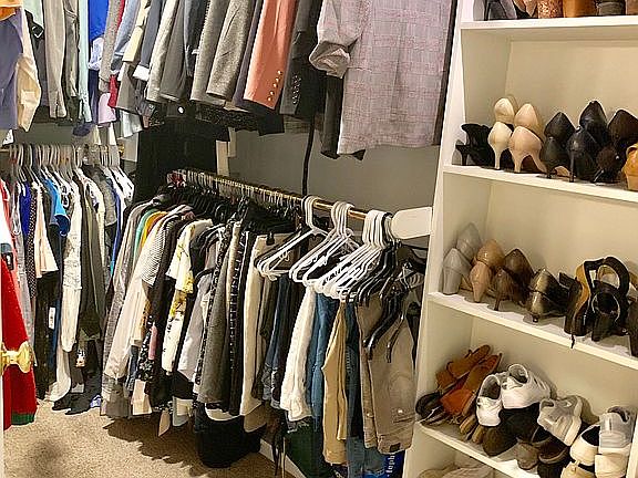 Walk in closet from bathroom
