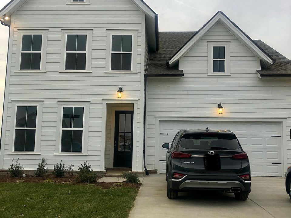 front of the house, on a corner lot