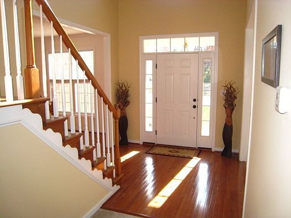 INVITING TWO-STORY FOYER