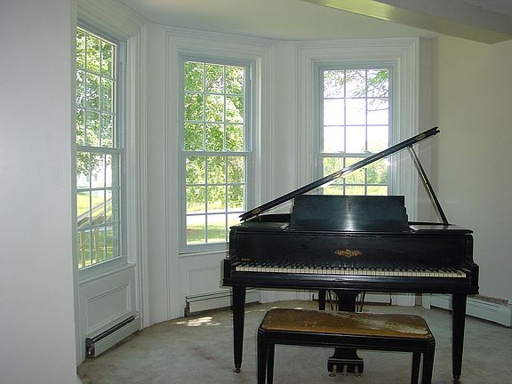 Living room with bay windows