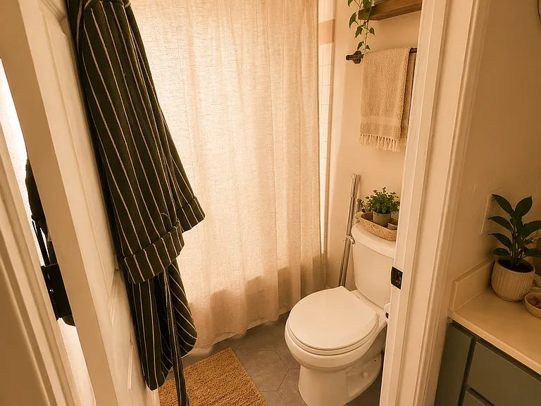 Virtually staged to showcase the home's layout with furnishings and highlight the potential look and feel of the furnished option.