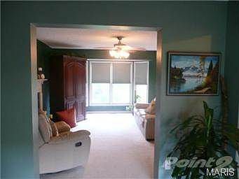 Looking from formal living room into the family room.