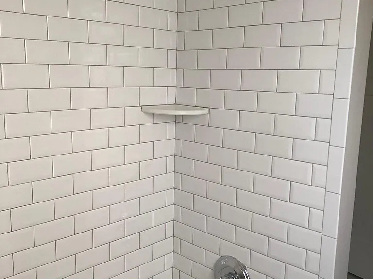 New subway tile and bathtub