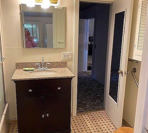 Bathroom with tile floor.