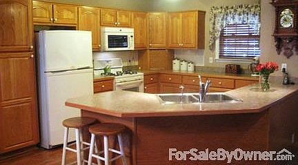 Kitchen
						:
						New appliances and island workspace with breakfast bar