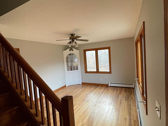 The living room of the unit, has access to the upstairs bathroom and bedroom.