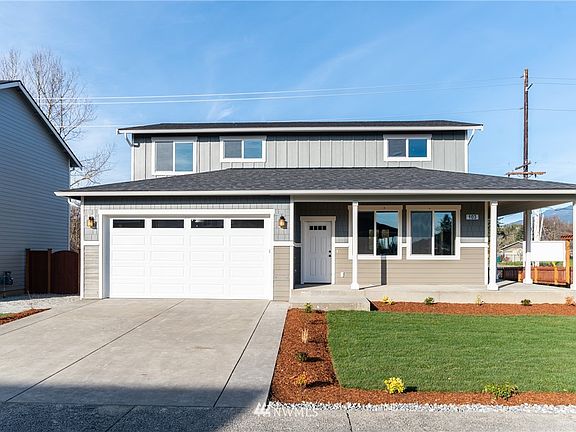 This picture and the completed pictures are of a different 2265 plan/house.  Features and colors may differ.