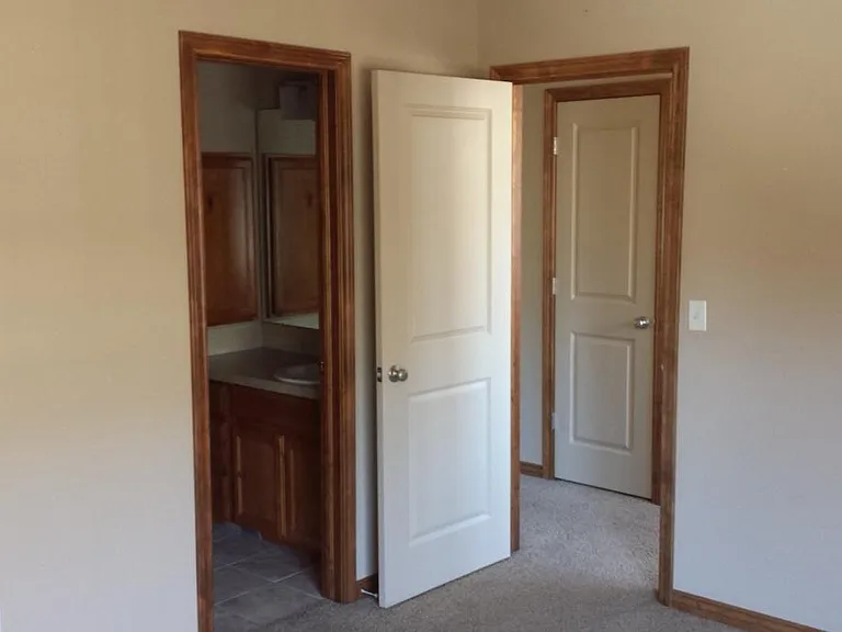 Inside room looking towards hallway and bathroom