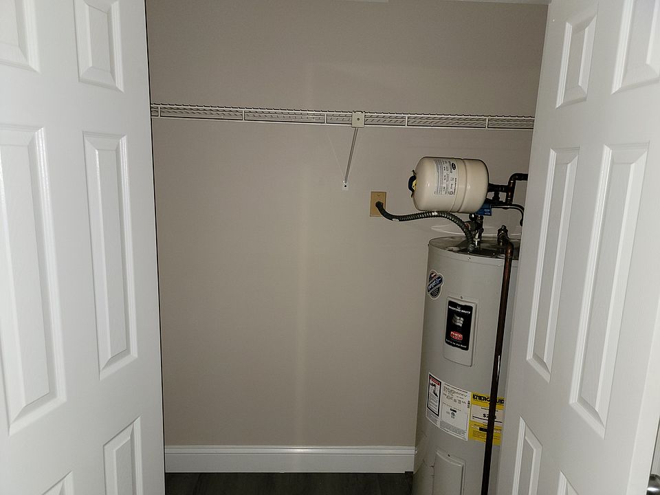 closet with hot water tank