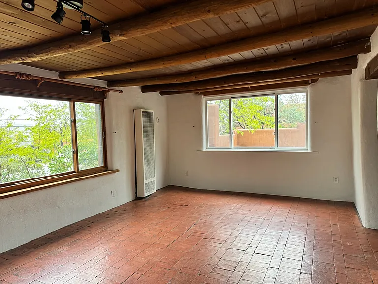 This is a photo of an adjacent unit to show the space without furniture.
