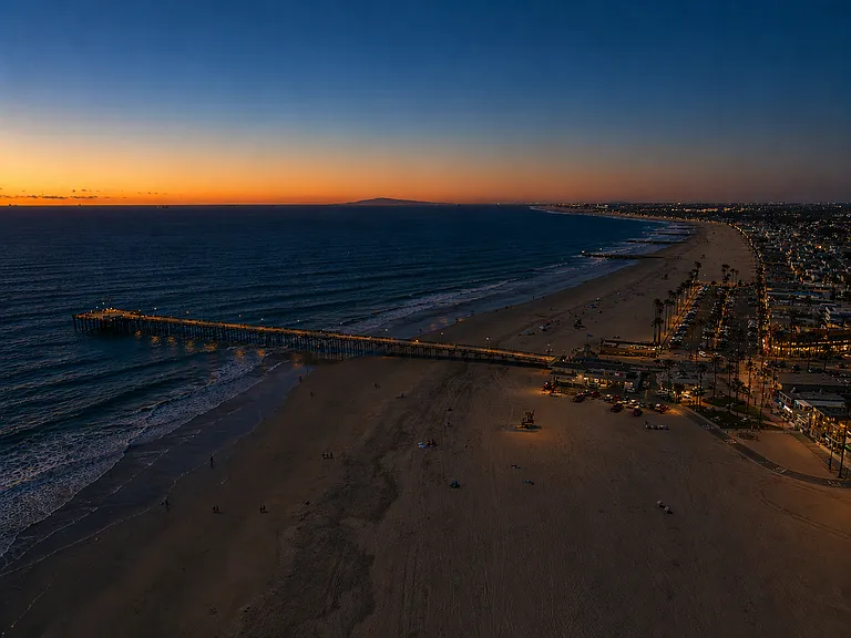 Sunset over Balboa Pier and ocean coastline