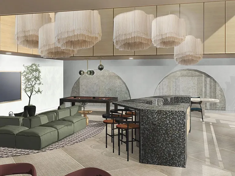 Visit our clubroom with game tables, sculptural lighting, and a sleek entertaining kitchen.