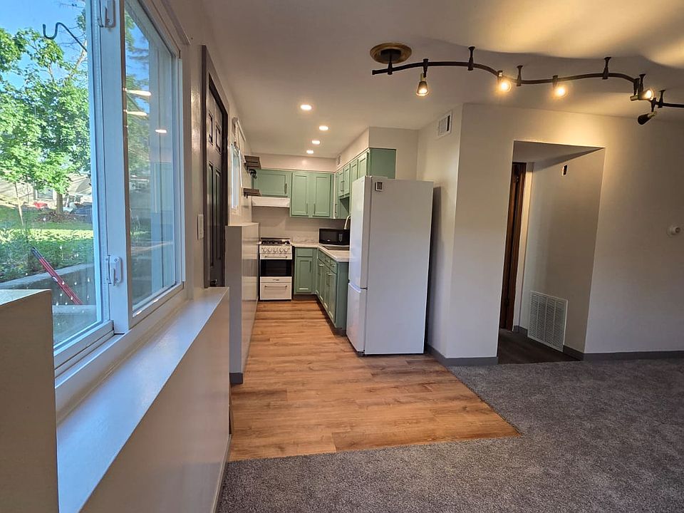 Living room looking into kitchen