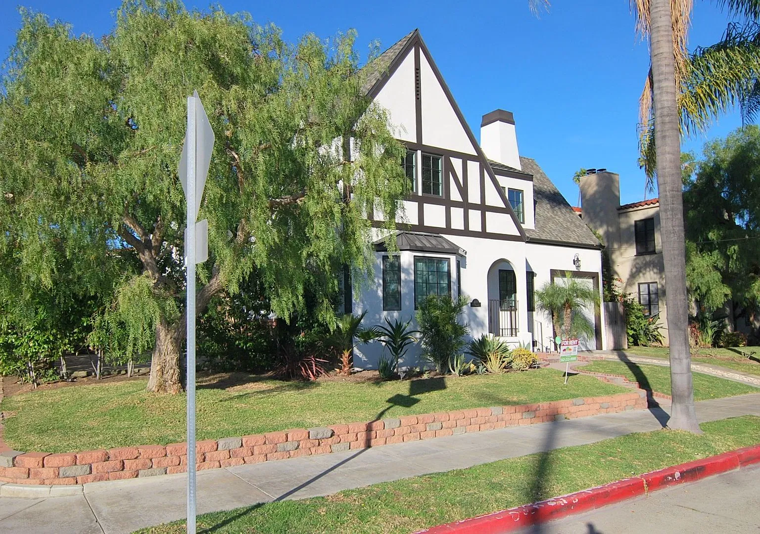 Two Story Classic Tudor with Contemporary Upgrades in Belmont Heights — Photo 2
