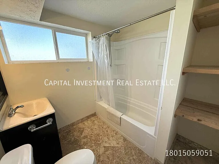 1102 E Sego Lily Dr — Photo 17