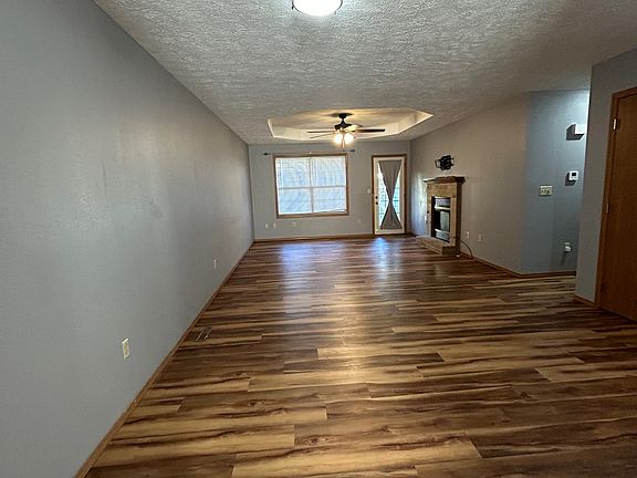 Open airy living room and dining area