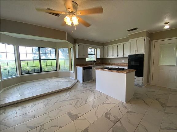 4th image of 9925 Woodie Ln
