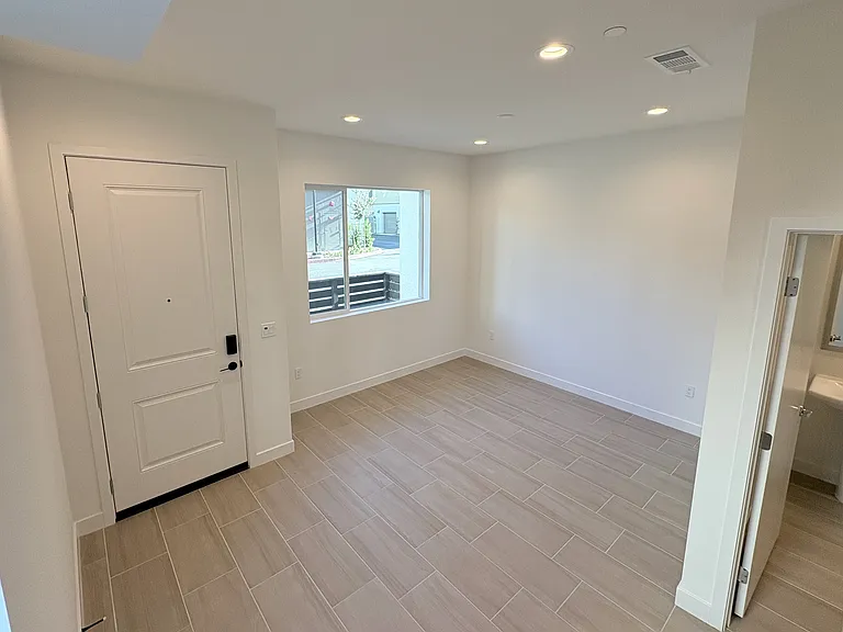 Entry - Live/work flex area (with half bathroom)