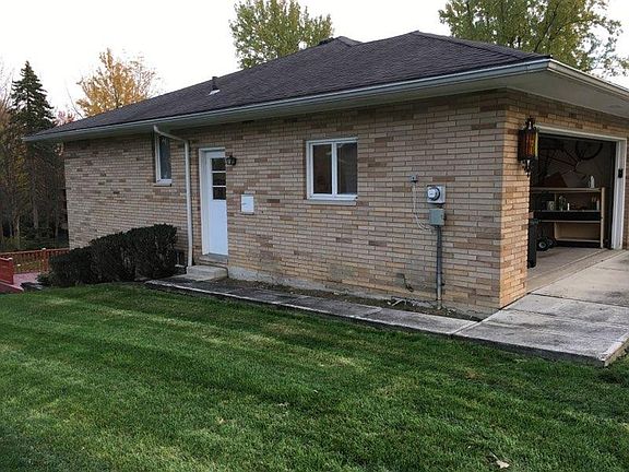 2 car garage with walk out door