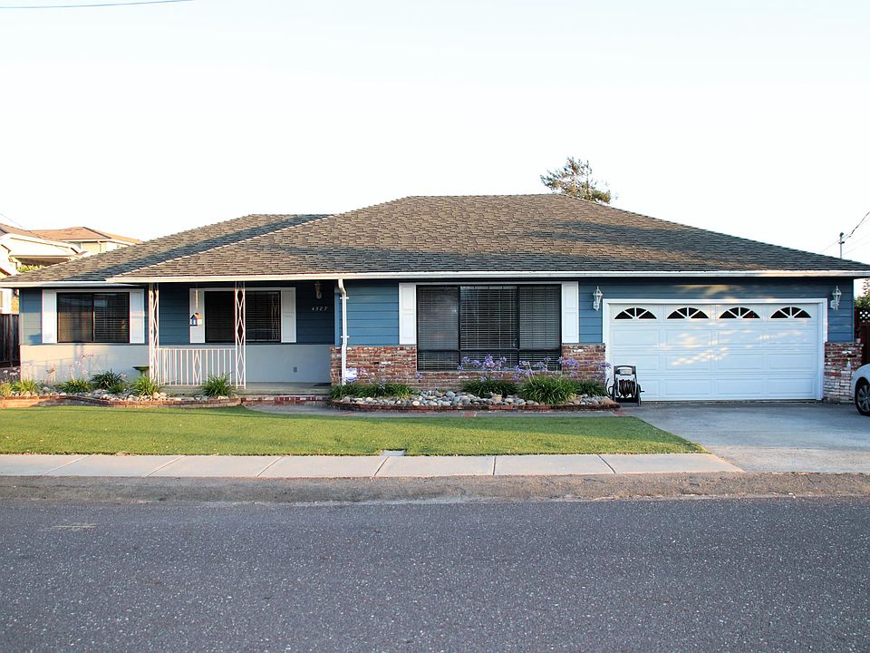 Front of house, porch, artificial lawn