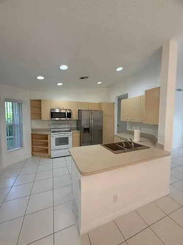 100 Cocoplum Cir Photo 1