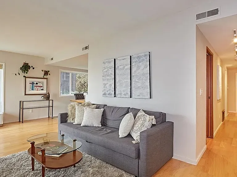 Living area and hallway to bedrooms