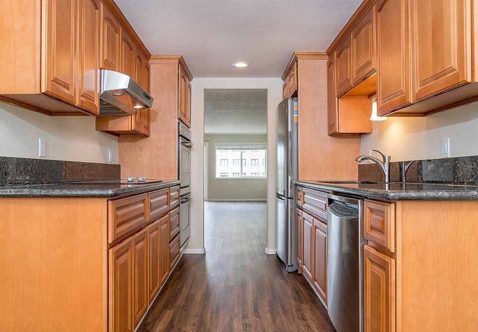 Spacious Kitchens with plenty of cabinet space and a breakfast nook off to the side