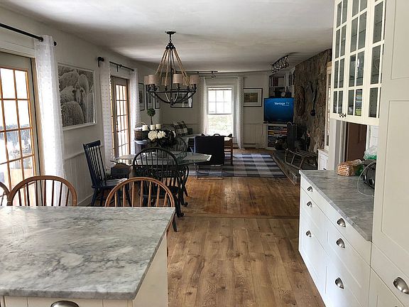 Kitchen open to the fam rm