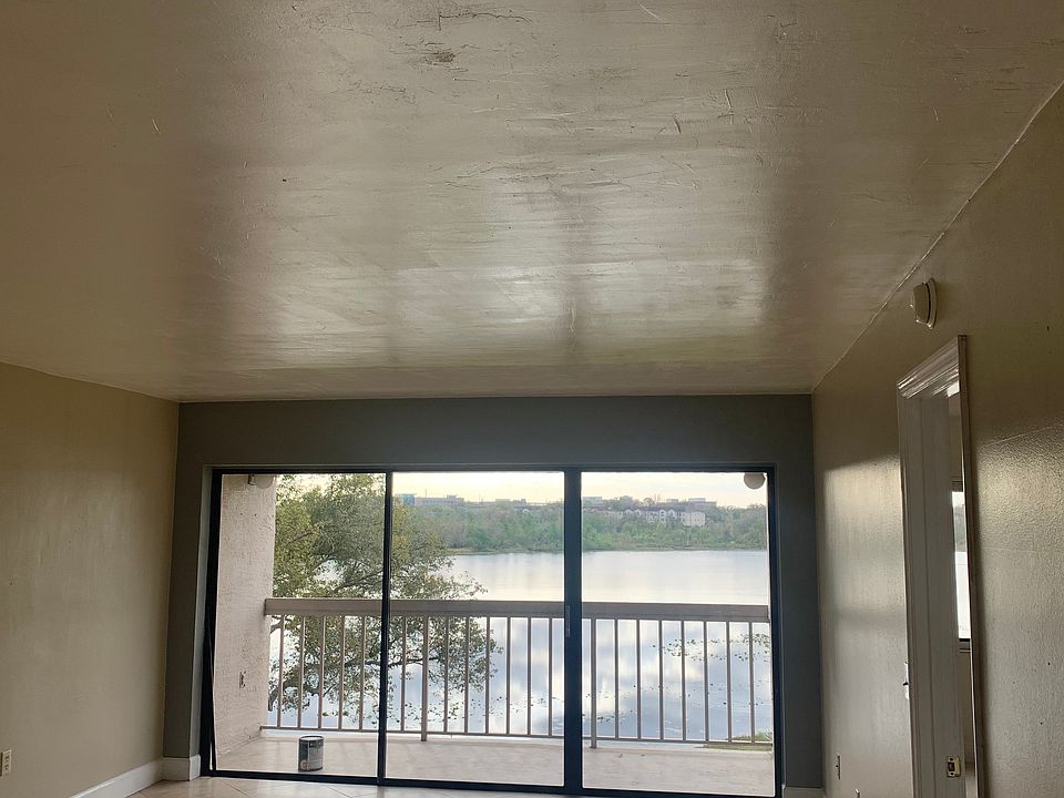 Living area, Master bedroom to the right.
