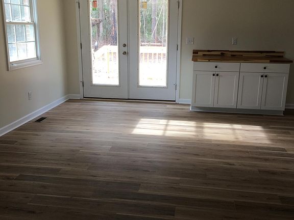Open concept of living and dining area.