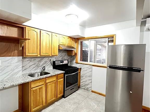 5th image of 8868 18th Ave Floor 1