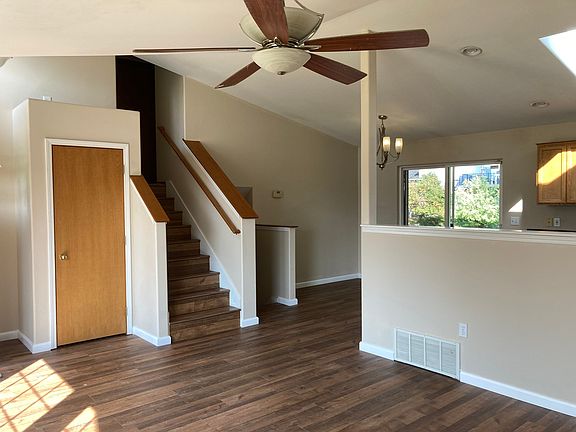 Looking from front room to dining room/kitchen