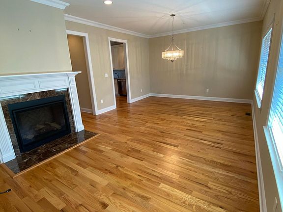 Large open floor living (11'7''x13'6'') and dining room (10'10''x13'6'') with gas fireplace