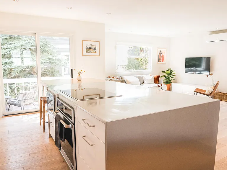 Checks kitchen with all SS high end appliances and built in espresso machine