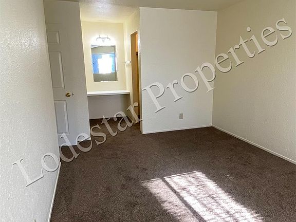 Master bedroom with built-in vanity