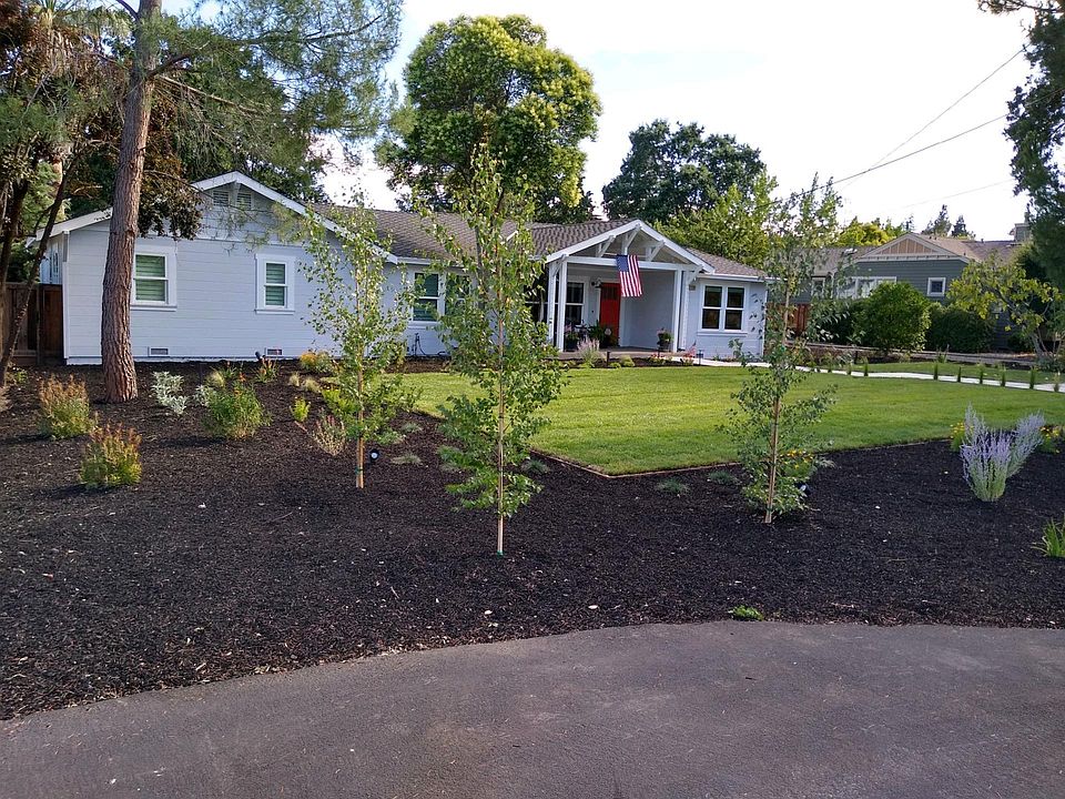 Front yard along 1st Ave.