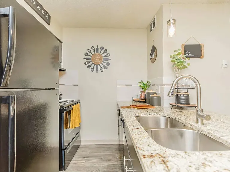 Welcome to The Riley, where modern design meets comfort. Enjoy stylish countertops, sleek appliances, and a spacious layout perfect for culinary adventures. Experience this unique living space today. Schedule your tour now!
