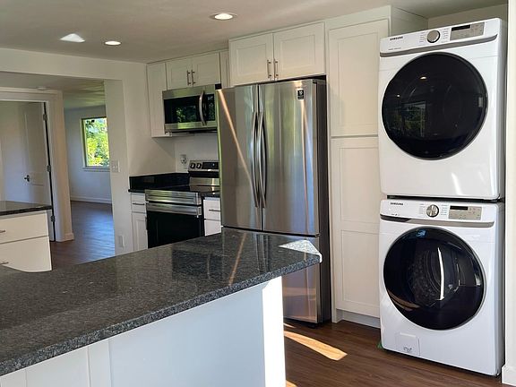 Kitchen area with new appliances