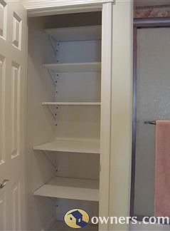 large linen closet in bathroom