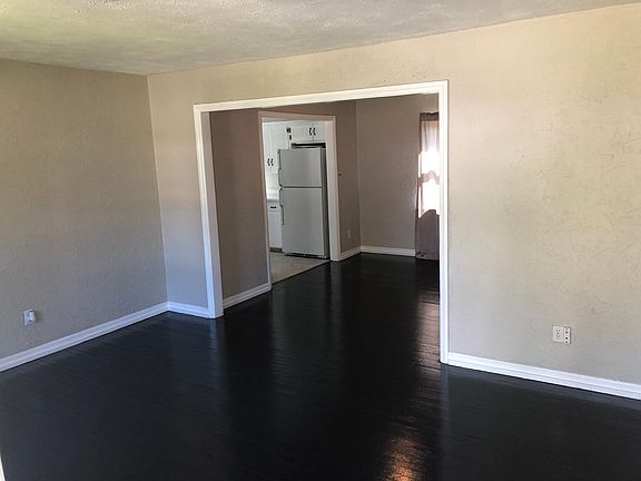 View from living room to dining room and kitchen