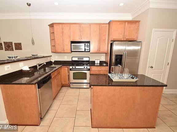 With and island and breakfast bar, you'll never be short on storage!