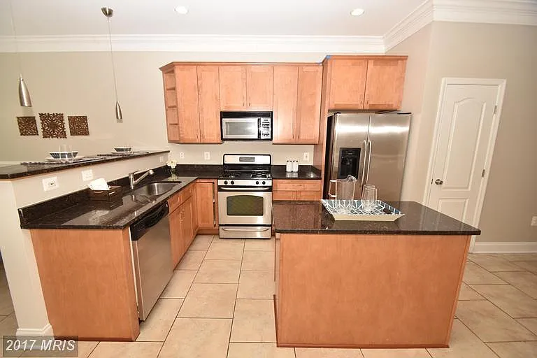 With and island and breakfast bar, you'll never be short on storage!
