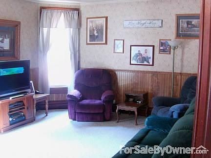 Large Front Room
						:
						Spacious-Allows for larger furniture, 
Wainscoting on Walls