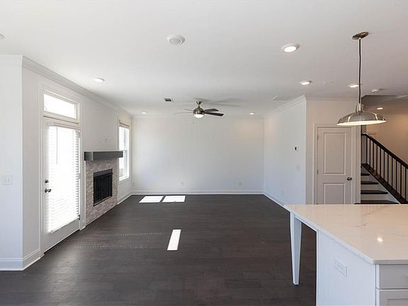 The family room has a door that leads to the patio.