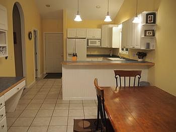 Kitchen appliances are included.