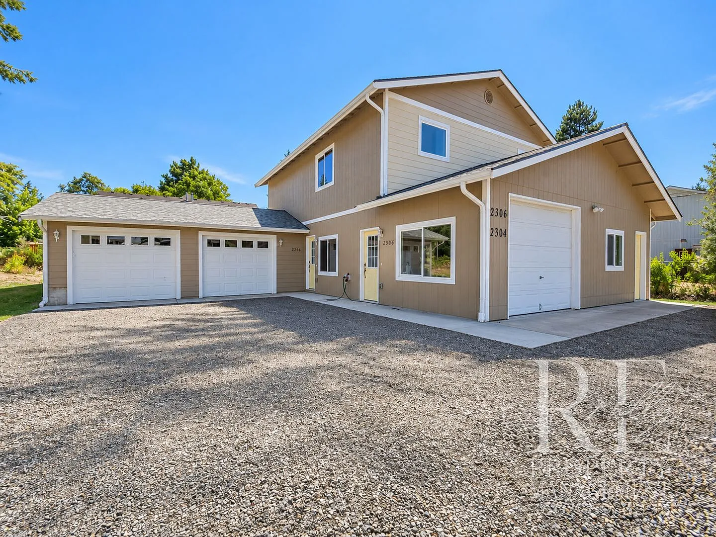 Newly Built 2-Bedroom Upper Duplex with Garage, AC & Designated Parking — Photo 1
