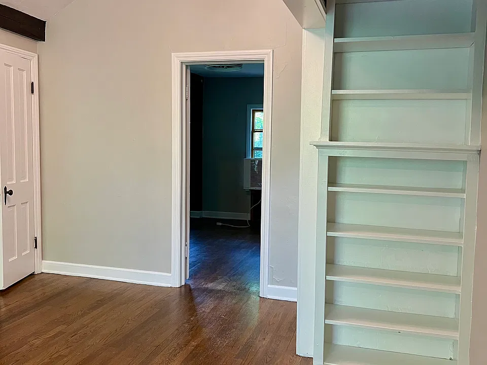 Living/great room nook with built in shelves.
