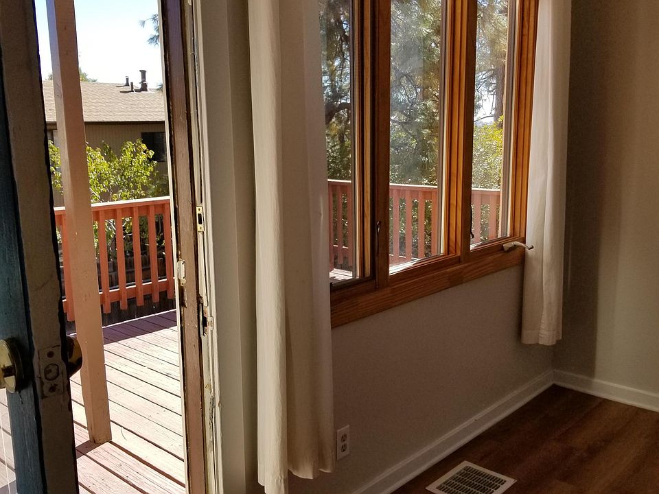 Partial dining area and door to back deck.