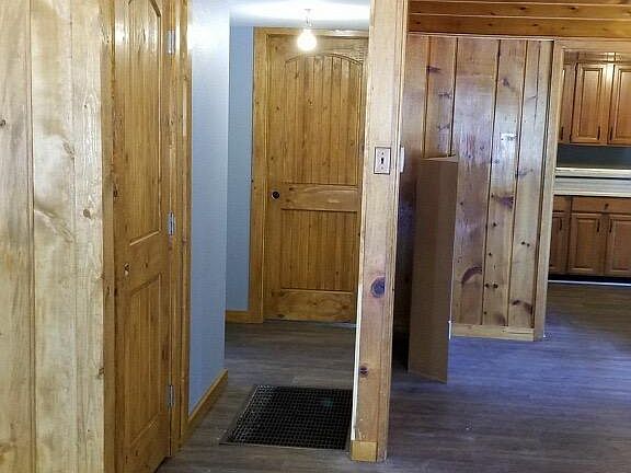 Hallway to the bathroom/master bedroom on left -- kitchen on right. *picture during renovation
